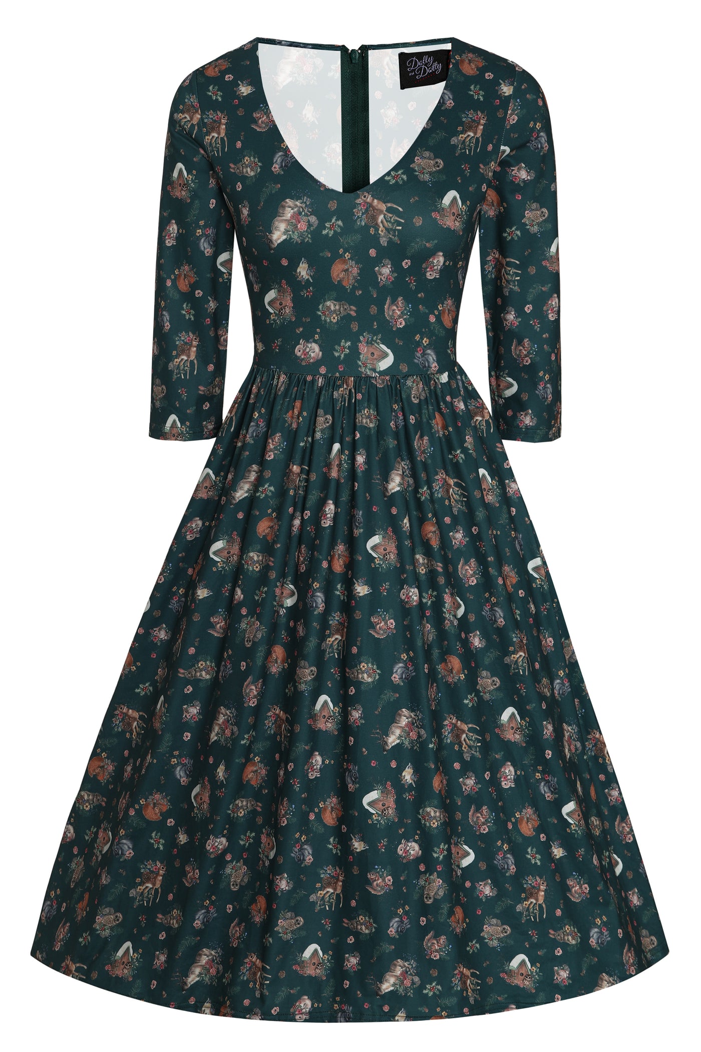 Front view of our dark green, long sleeved flared dress, with a woodland print