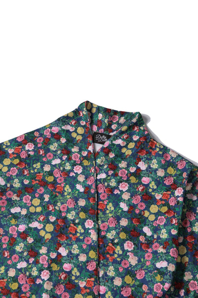 Close up View of Wrap Around Blue Floral Rose Garden Top in Navy and Red