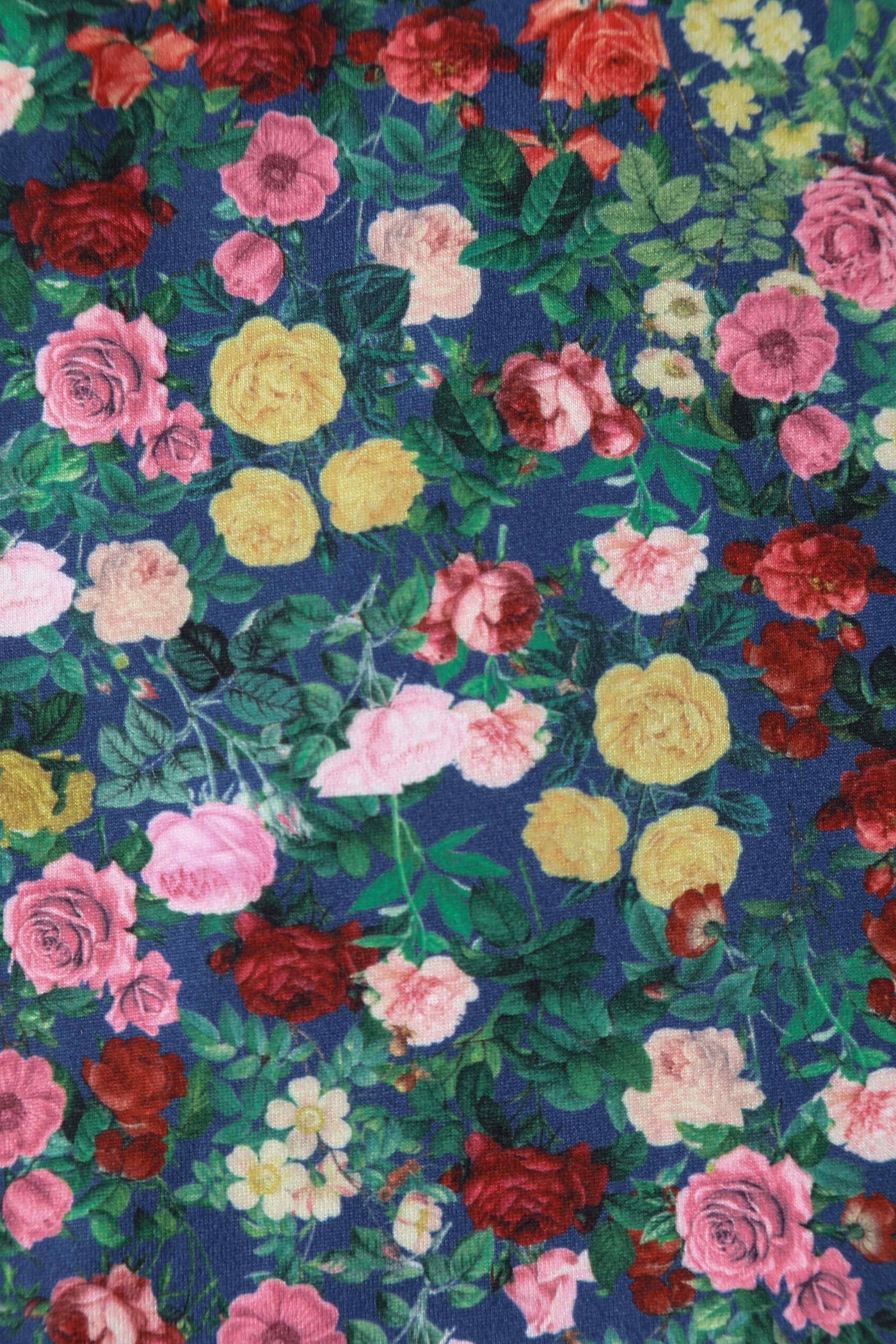 Close up View of Wrap Around Blue Floral Rose Garden Top in Navy and Red