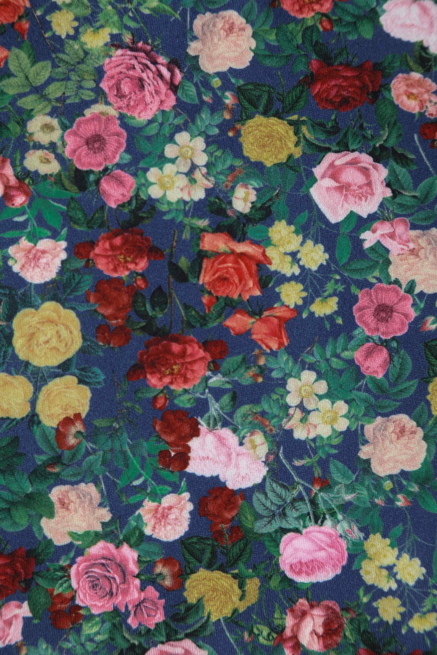Close up View of Wrap Around Blue Floral Rose Garden Top in Navy and Red