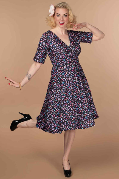 A lady wearing a Y2K Goth Punk Wrap Dress