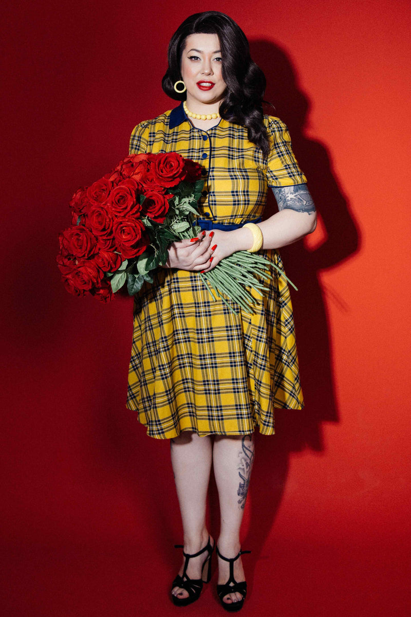 A model wearing a Yellow Tartan Shirt Dress