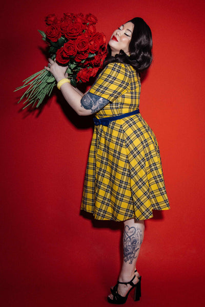 A model wearing a Yellow Tartan Shirt Dress