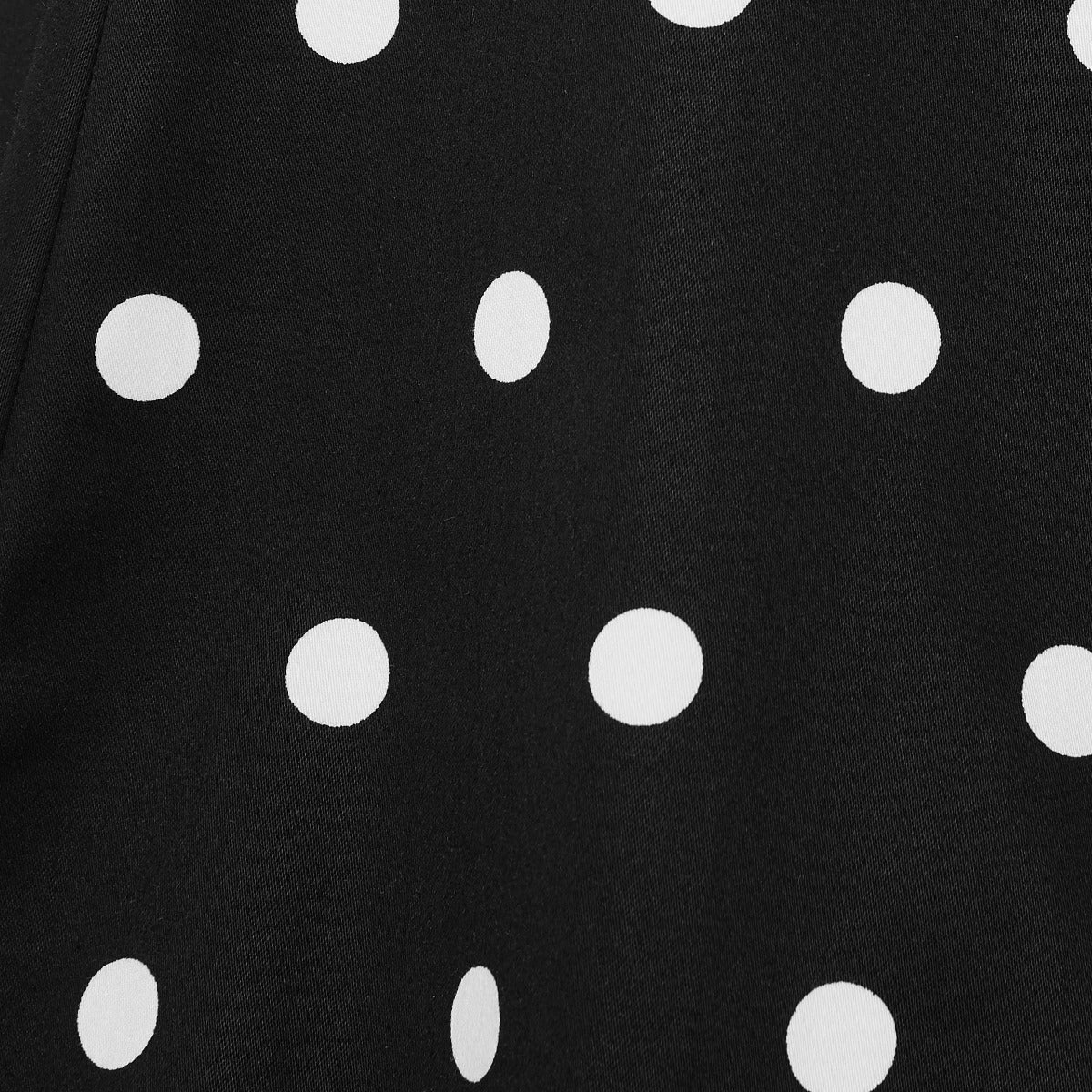 black fabric, with white polka dots