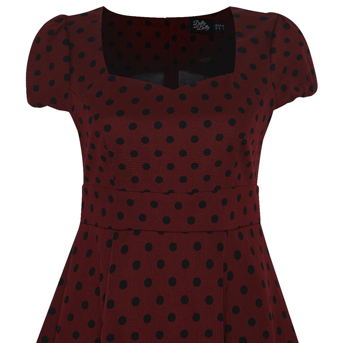 Burgundy dress with black polka dots close up
