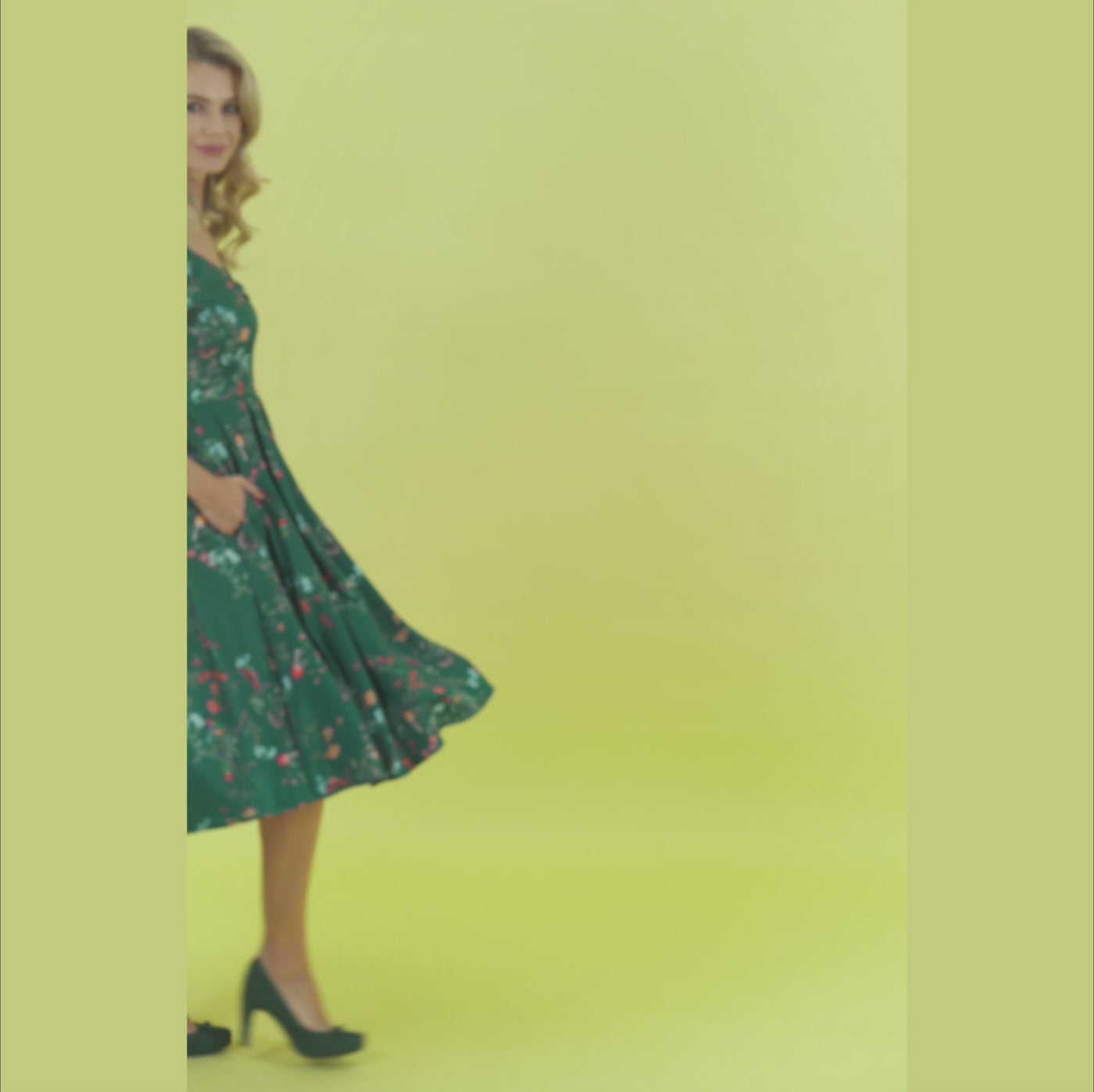Video of a model wearing our Lily Green Bird Forest Off Shoulder Swing Dress.