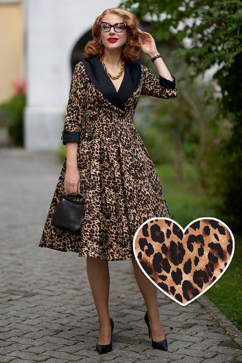Woman wearing Tiffany lapel coat dress, in brown leopard print, with vintage glasses