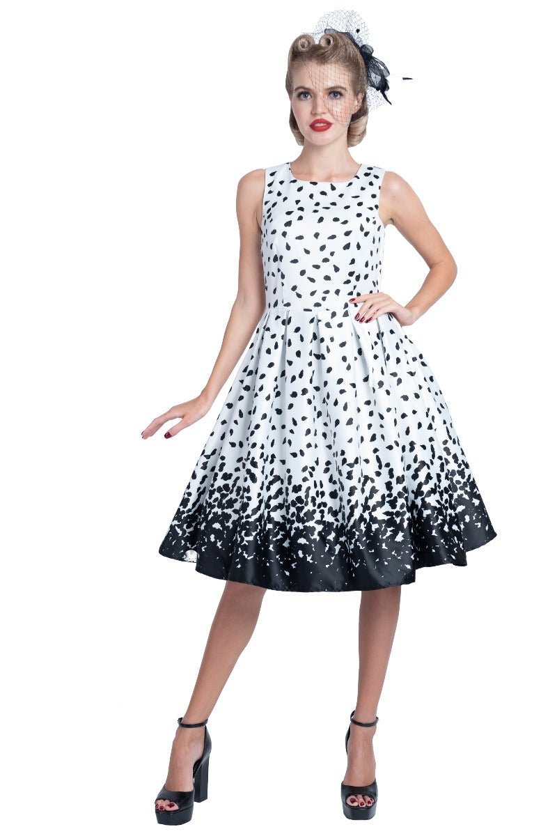Model wearing our white Annie swing dress, with black brush strokes, front view