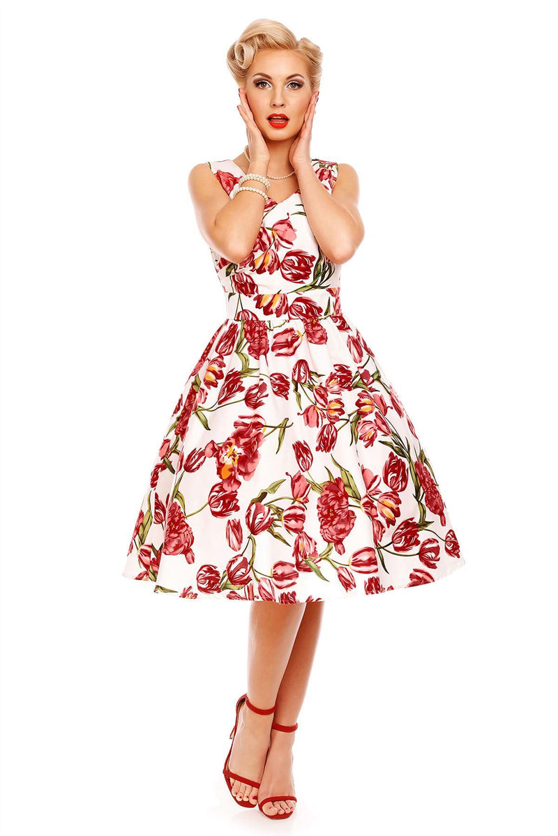 Model wearing our V neck May dress, in white, with pink tulips, front view