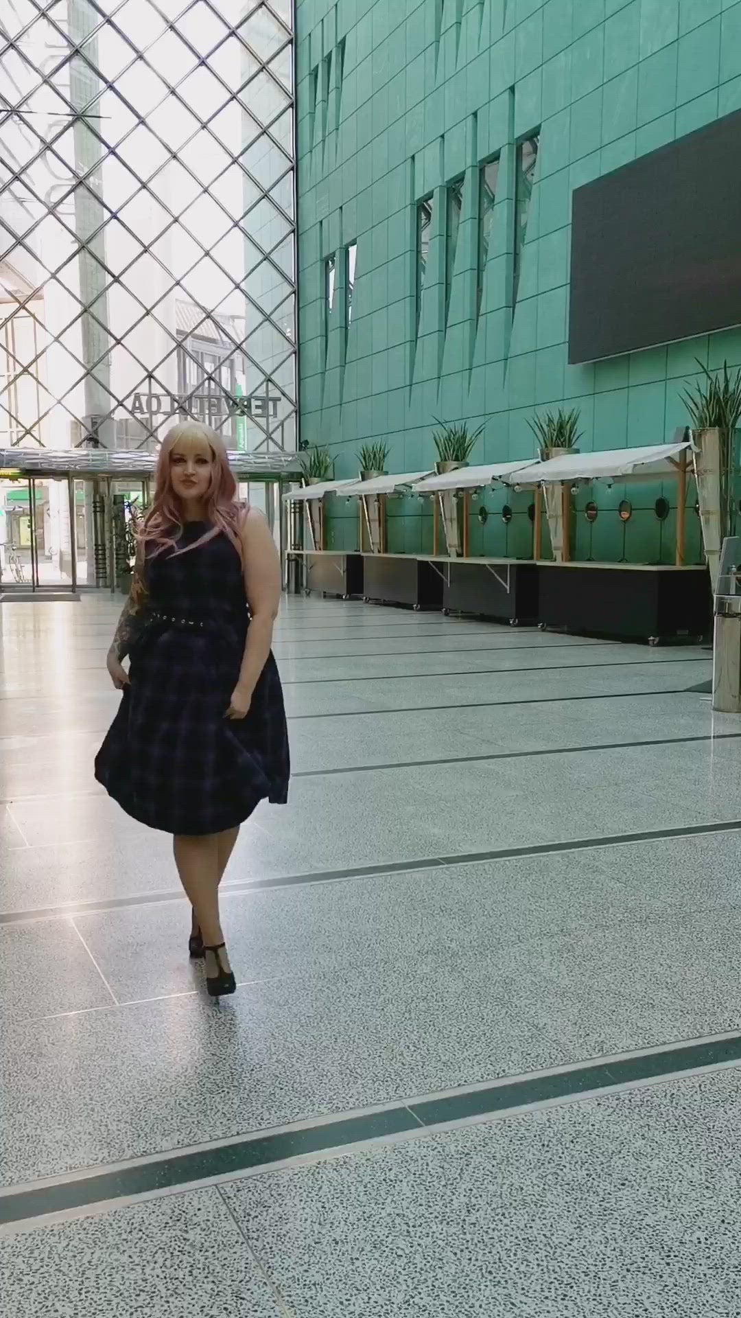 A video of rMs. osaliewildcat wearing our Annie Vintage Black/Purple Tartan Check Swing Dress.