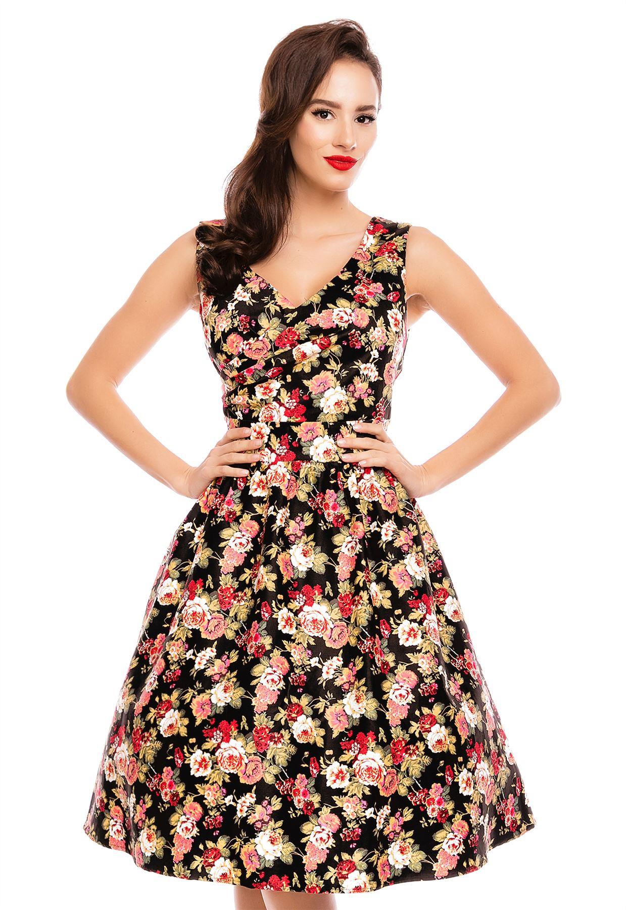Model wearing our crossover bust May dress, in black/pink floral print, close up view