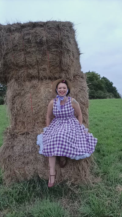missbunnyceline wearing Vintage Inspired Purple Gingham Swing Dress at the field