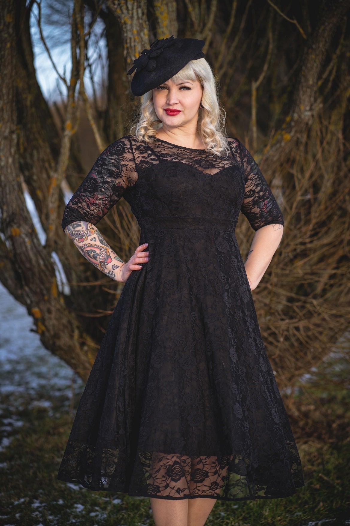 A model wearing Black Formal Lace Dress