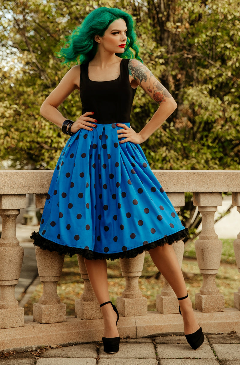 A model wearing Blue & Black Polka Dot Flared Dress