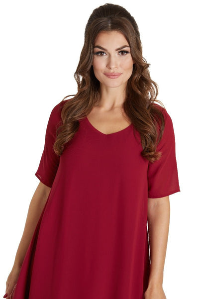 Model wears our Dora summer day casual dress in burgundy red, close up view