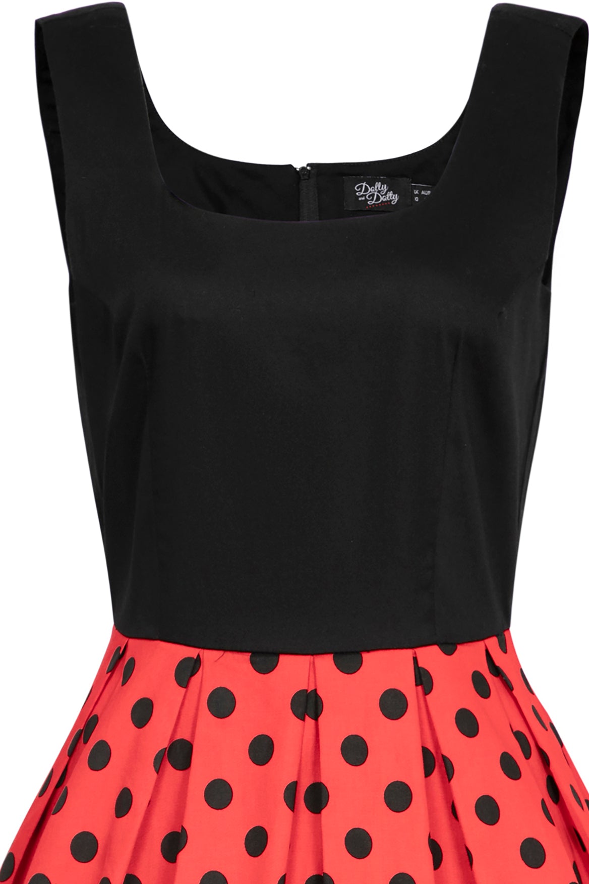 Sleeveless Amanda dress, with black top and red skirt, with black polka dot spots, close view