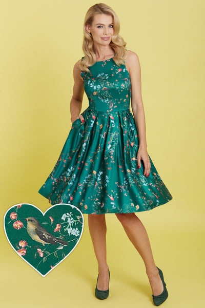 A model wearing Green Bird Print Dress