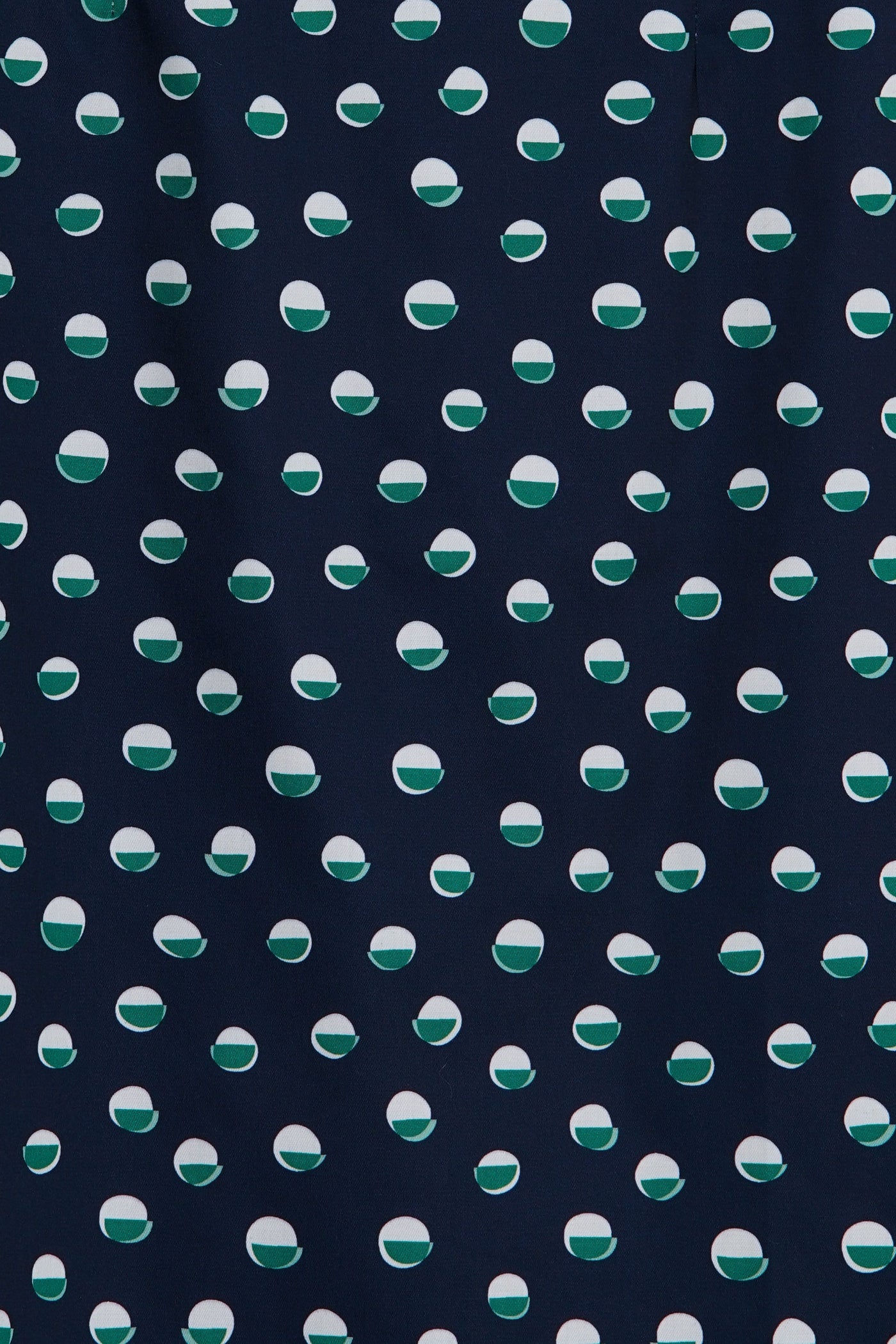 Close up view of Navy Pencil Skirt With White & Green Polka Dots