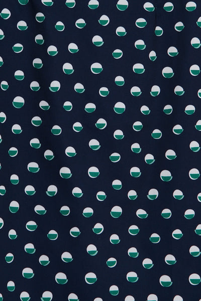 Close up view of Navy Pencil Skirt With White & Green Polka Dots