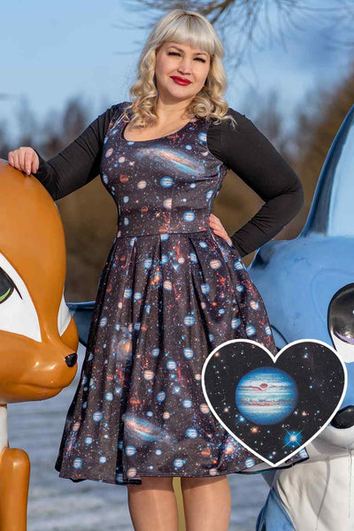 Influencer wearing sleeveless black galaxy space print