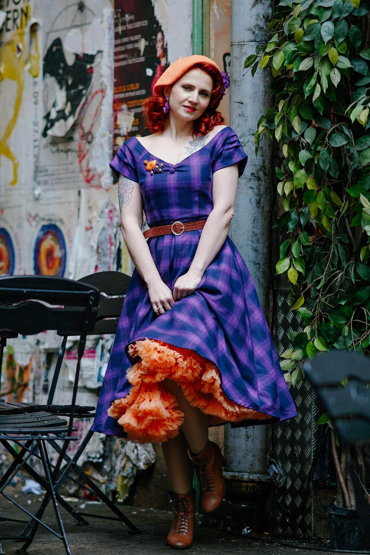 Influencer wearing purple tartan check swing dress with petticoat