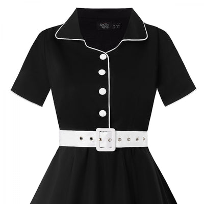 Short sleeve Penelope diner button top dress, in black and white, close up view