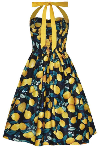 Sophia Halterneck Flared dress in black, with yellow lemons, back view