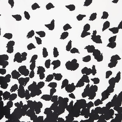 White fabric, with black brushstroke spots