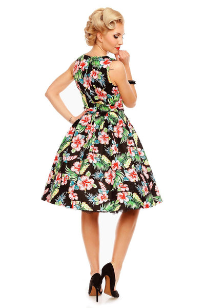 Model wearing our Annie dress, in black/pink orchid floral print, back view