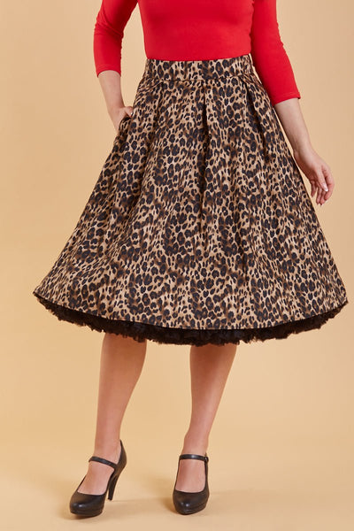 Model wearing leopard print skirt with black petticoat close up