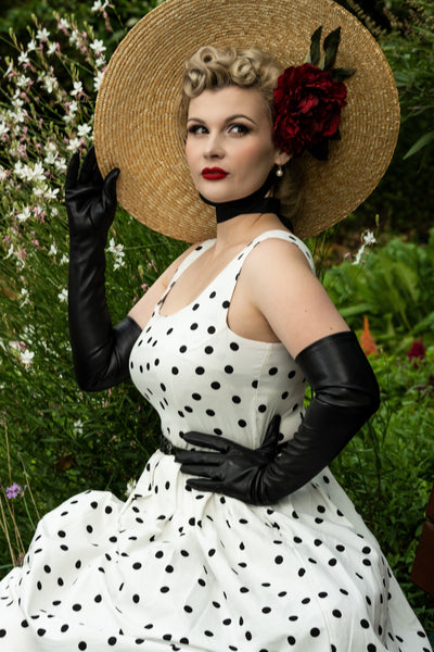 A model wearing Scoop Neck Polka Dot Swing Dress in White-Black