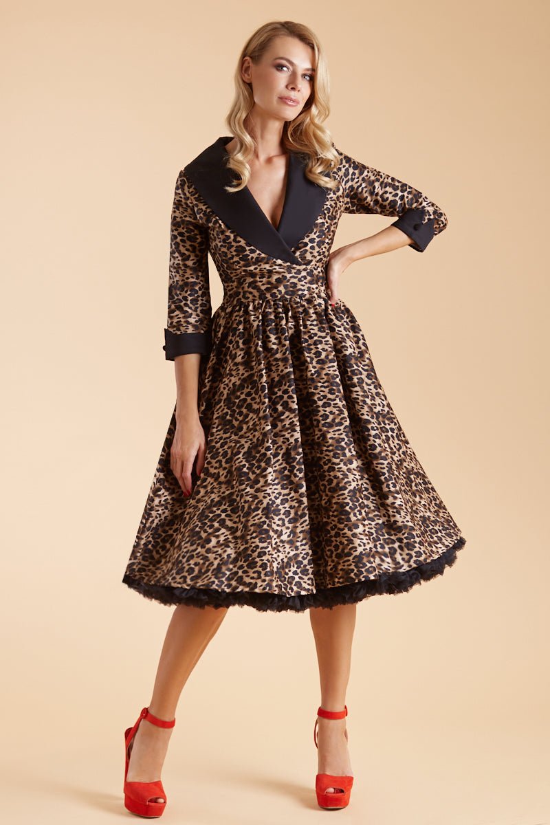 Model wearing our tiffany lapel coat dress, in brown leopard print, with black petticoat, front view