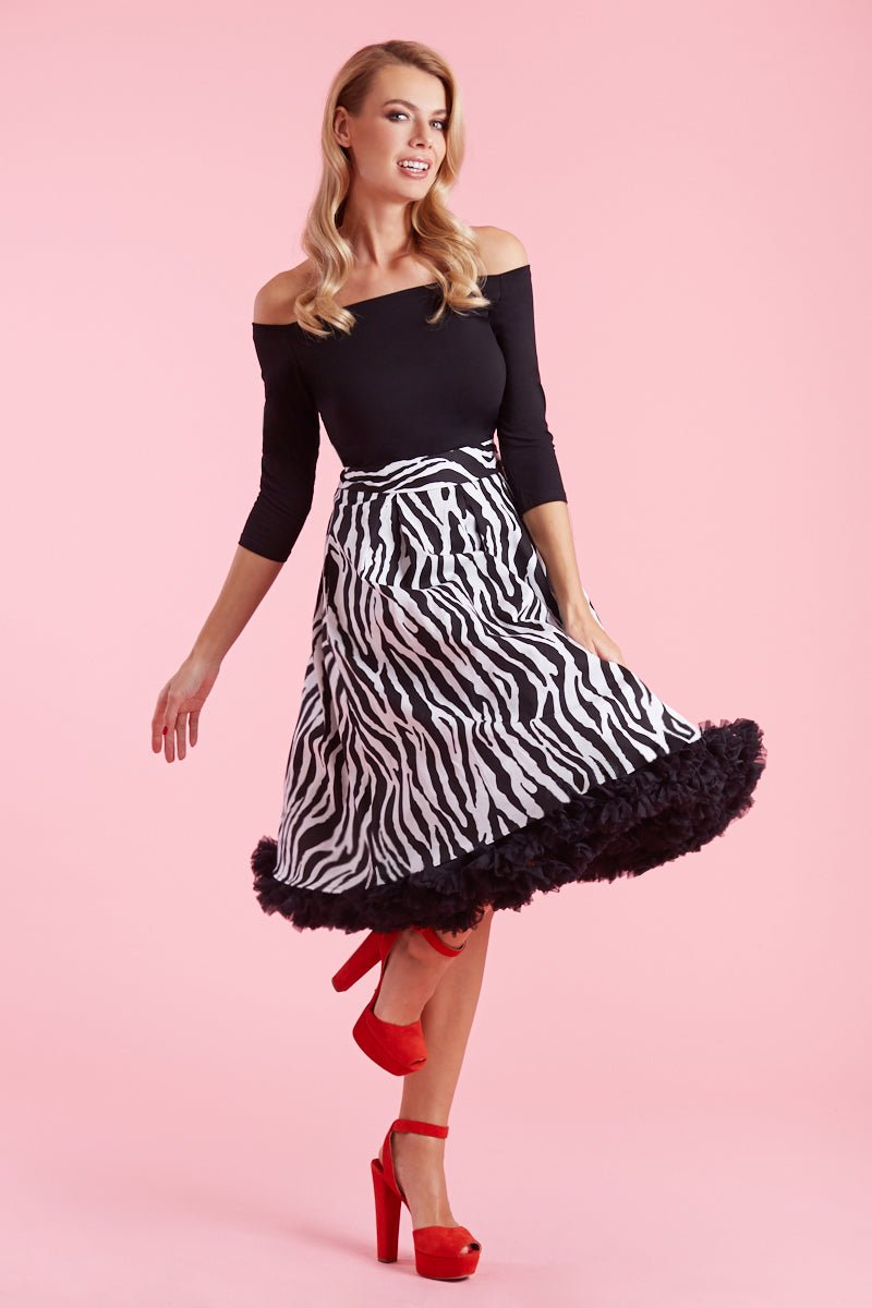 Model wearing zebra print flared skirt