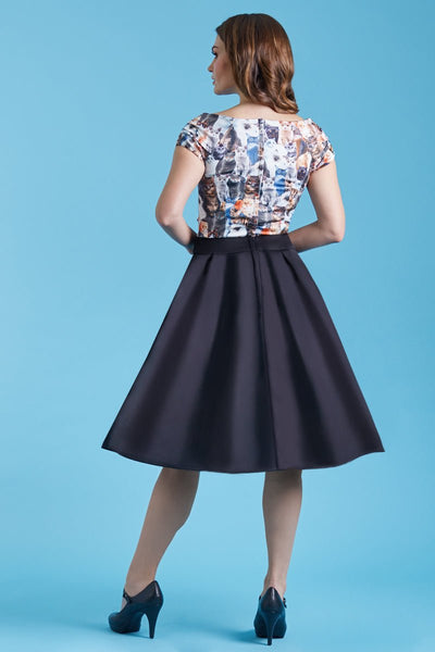 Model wears our V neck, short sleeved top, in cats print, back view