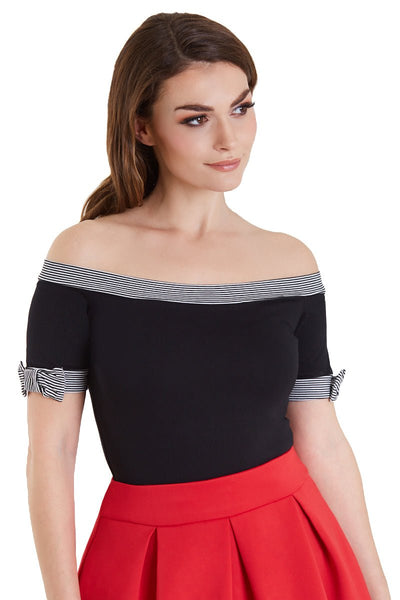Model in off shoulder black top with striped trims