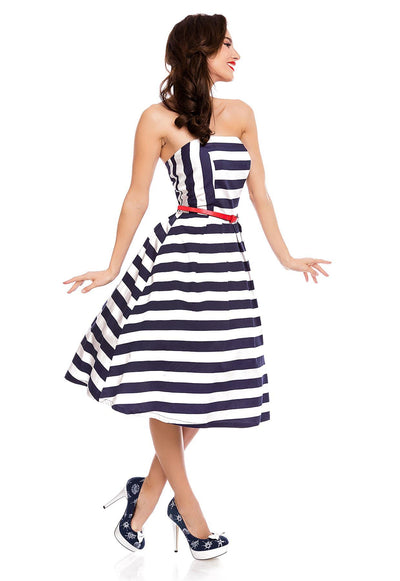 Model in sleeveless bandeau white blue striped dress