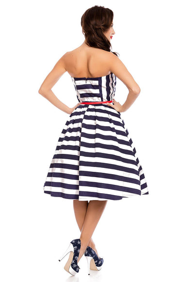 Model in white blue striped dress back view
