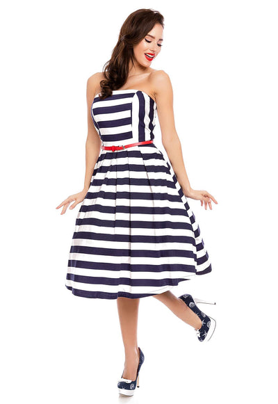 Model in strapless white blue striped retro dress