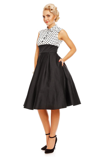 Model wearing the Lisa shirt top fit and flare dress, side view