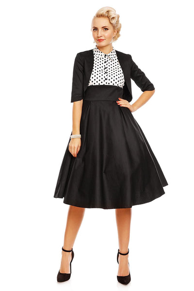 Model wearing the Lisa button top fit and flare dress, with jacket, front view