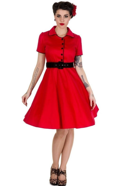Model wears our short sleeve Penelope button up dress in red and black, front view