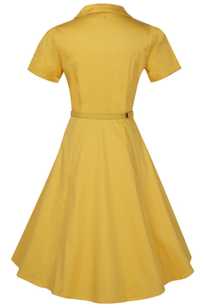 Short sleeved button top dress, in plain yellow, with belt, back view