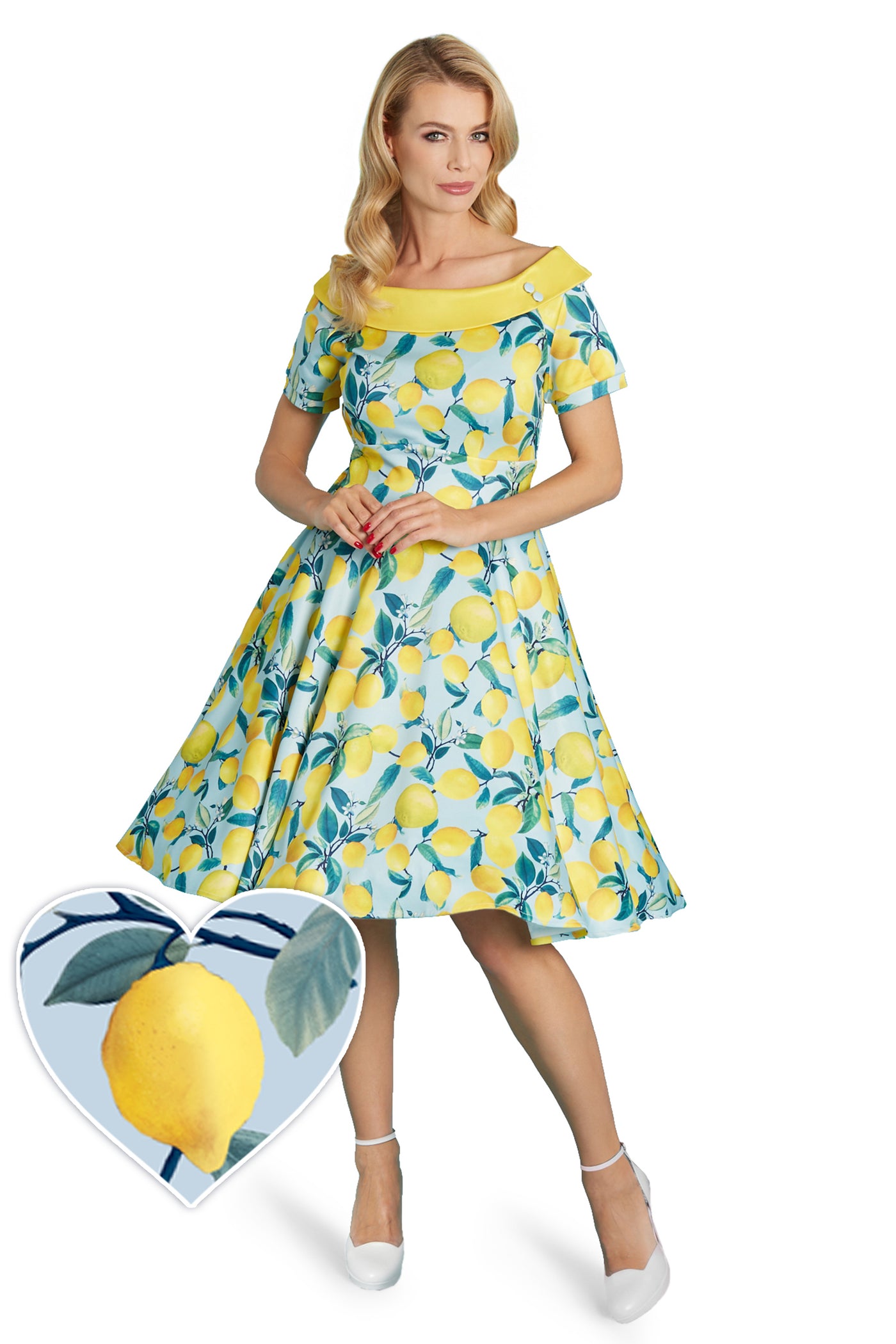 Model wears our bateau short sleeved swing dress, in blue/yellow lemon print, front view