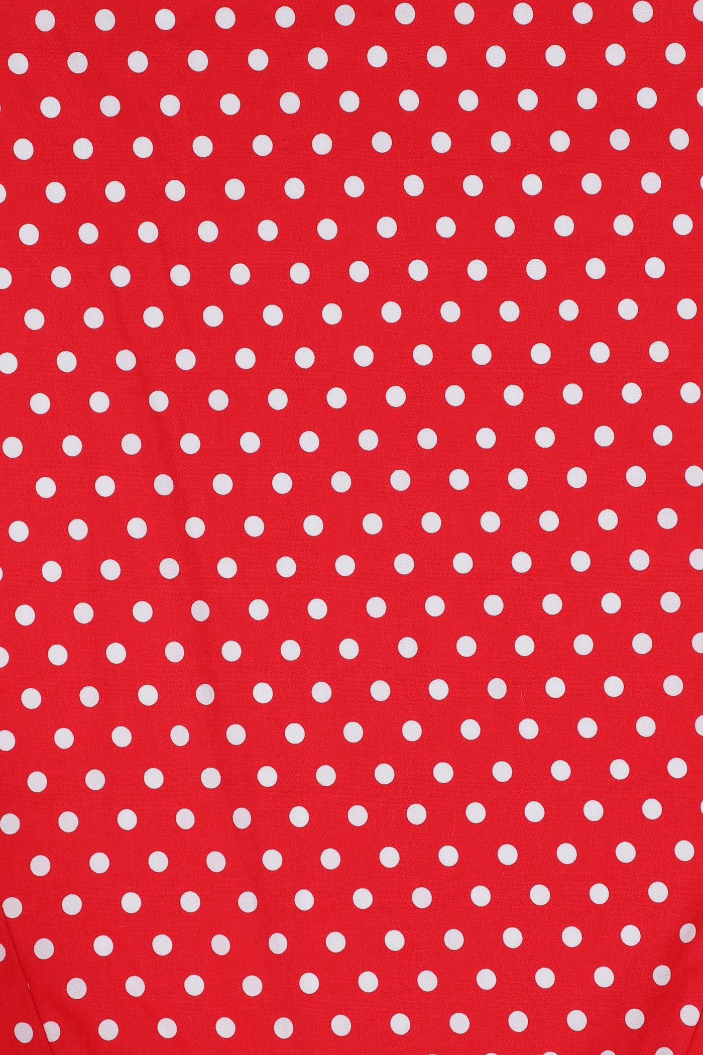 Red fabric with white polka dots