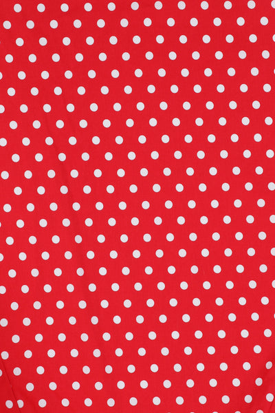 Red fabric with white polka dots