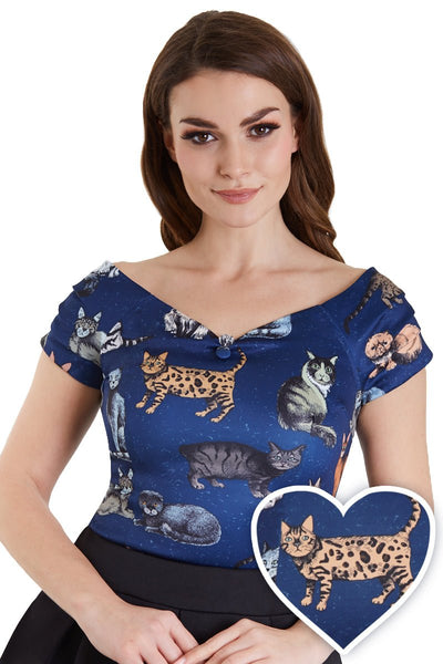 Model wears our V neck, short sleeved top, in dark blue, with cats print, top view