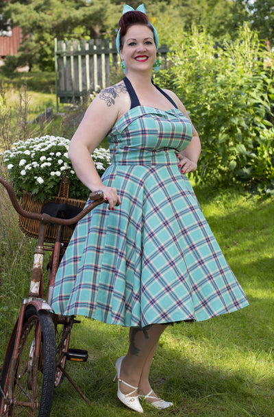 Influencer wearing aqua halterneck check vintage dress