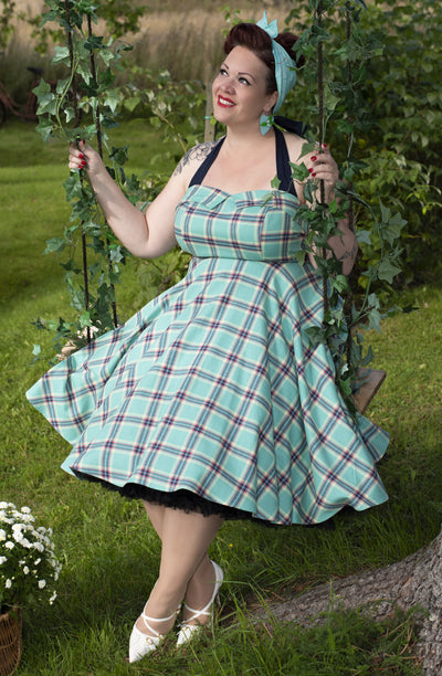 Influencer wearing aqua halterneck check vintage dress