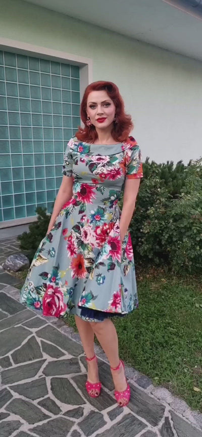 Video of Ms. Miss.sweet.carolina wearing our  Darlene Blue Floral Swing Dress.