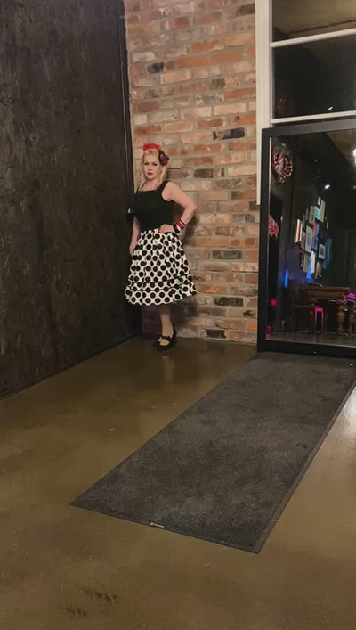 Video of model posing wearing Retro Monotone Polka Dot Dress